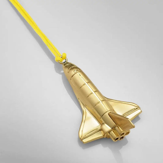 Gold-colored space shuttle-shaped