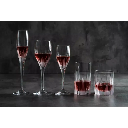 Set of wine glasses with red liquid