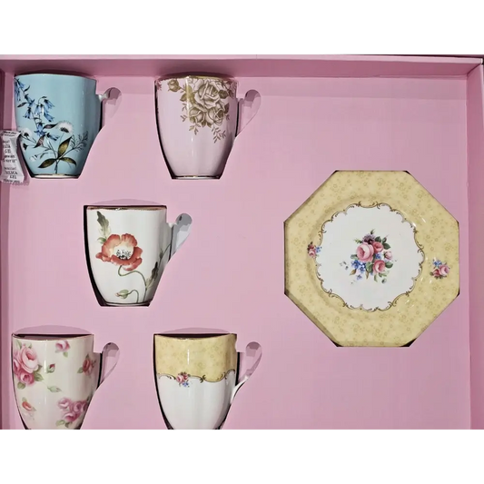Set of floral ceramic mugs and a plate 