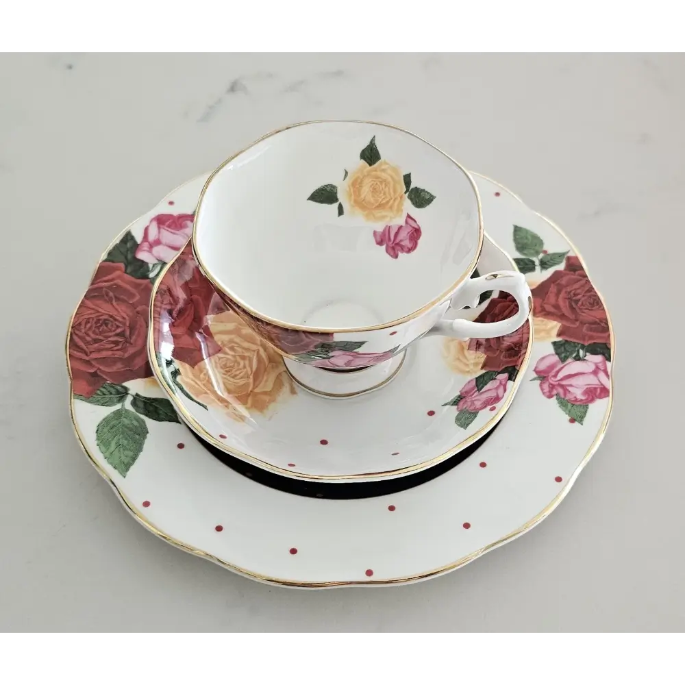 Floral teacup and saucers on a gray background