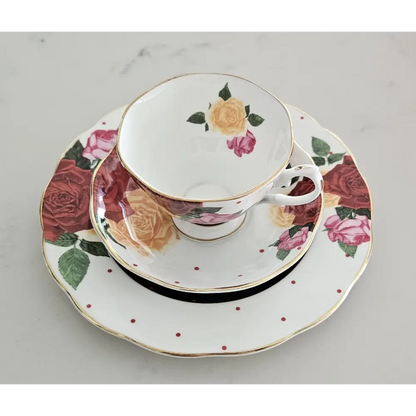 Floral teacup and saucers on a gray background