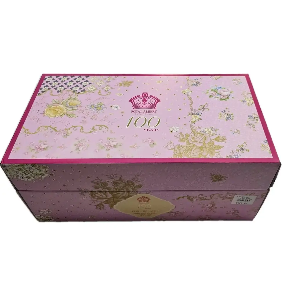 Decorative box with floral patterns and '100 Years' text on a white background