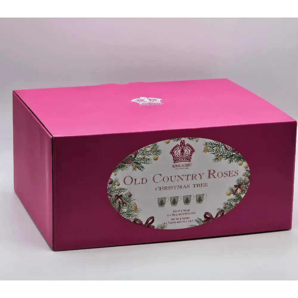 Pink box with 'Old Country Roses' Christmas tree label on a gray background
