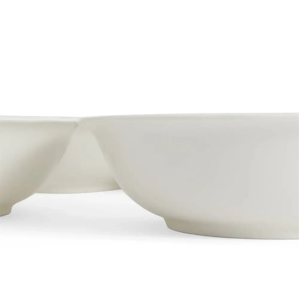 Two white ceramic bowls on a white background
