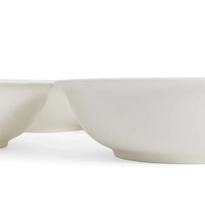 Two white ceramic bowls on a white background