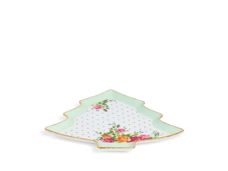 Decorative Christmas tree-shaped plate with floral design on a white background