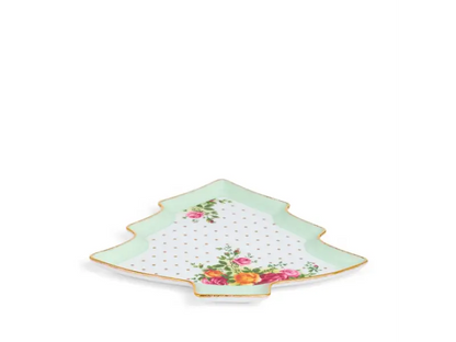 Decorative Christmas tree-shaped plate with floral design on a white background