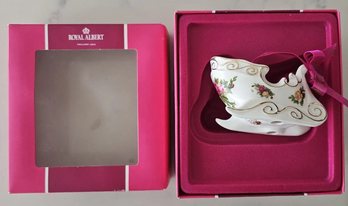 Royal Albert Old Country Roses sleigh ornament in window box