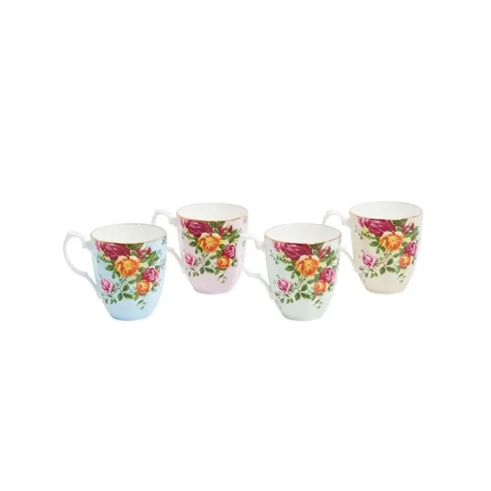 Set of four floral mugs on a white background