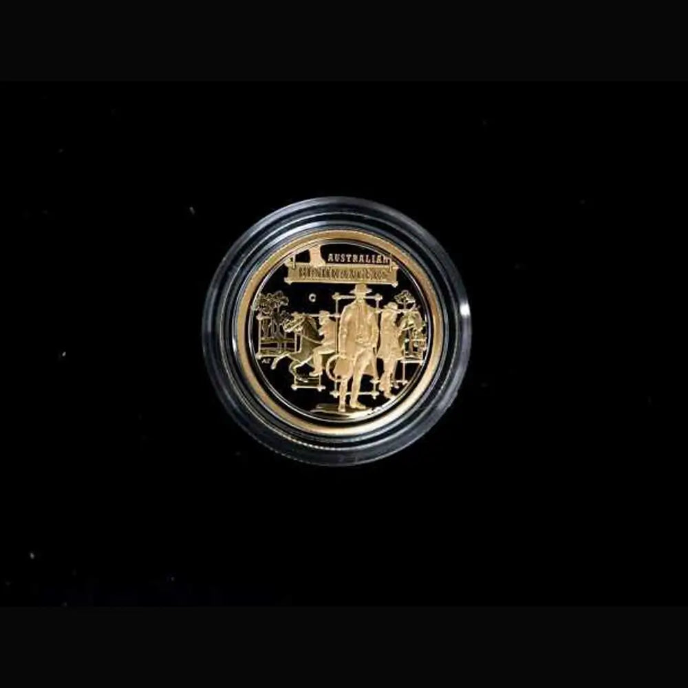 A round gold-toned collectible coin or medallion displayed inside a clear protective capsule, centered on a solid black background from our World & Vintage Coins collection 