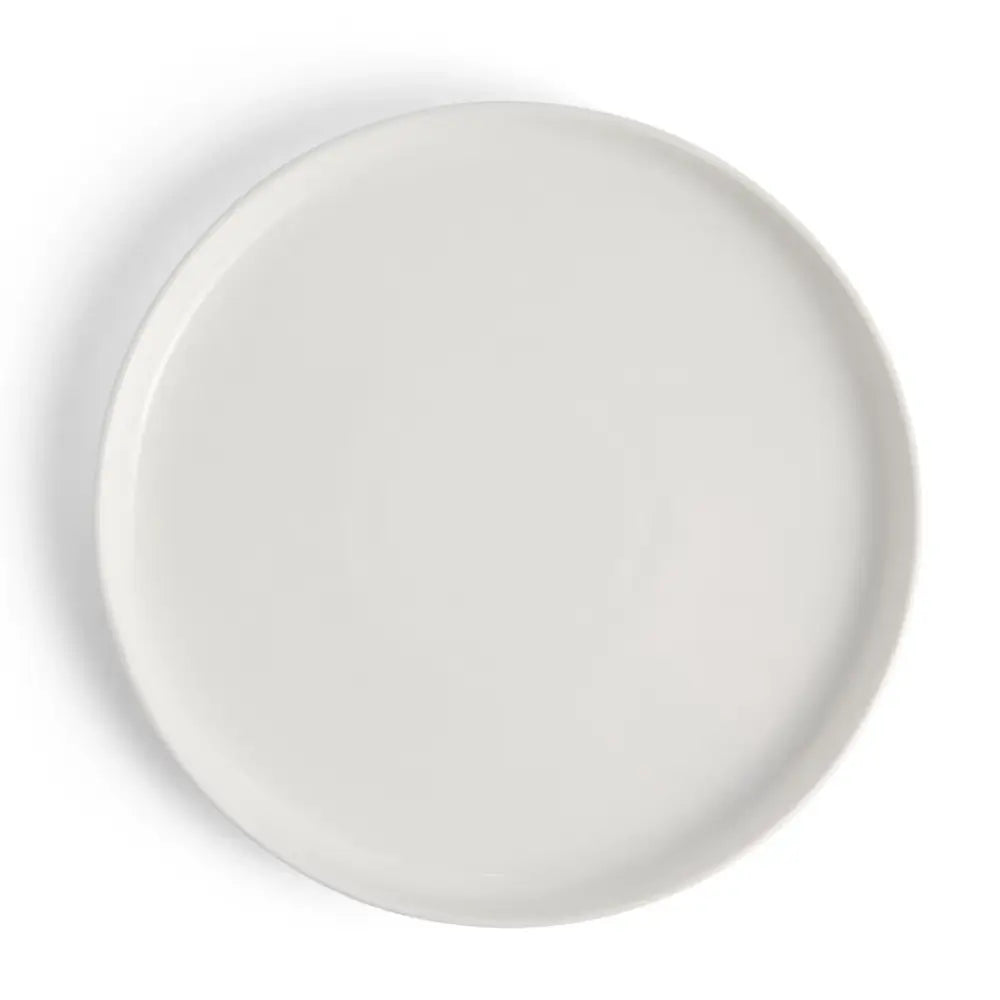 White ceramic plate on a white background