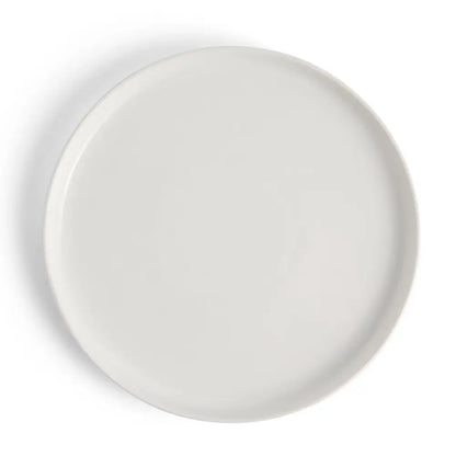 White ceramic plate on a white background