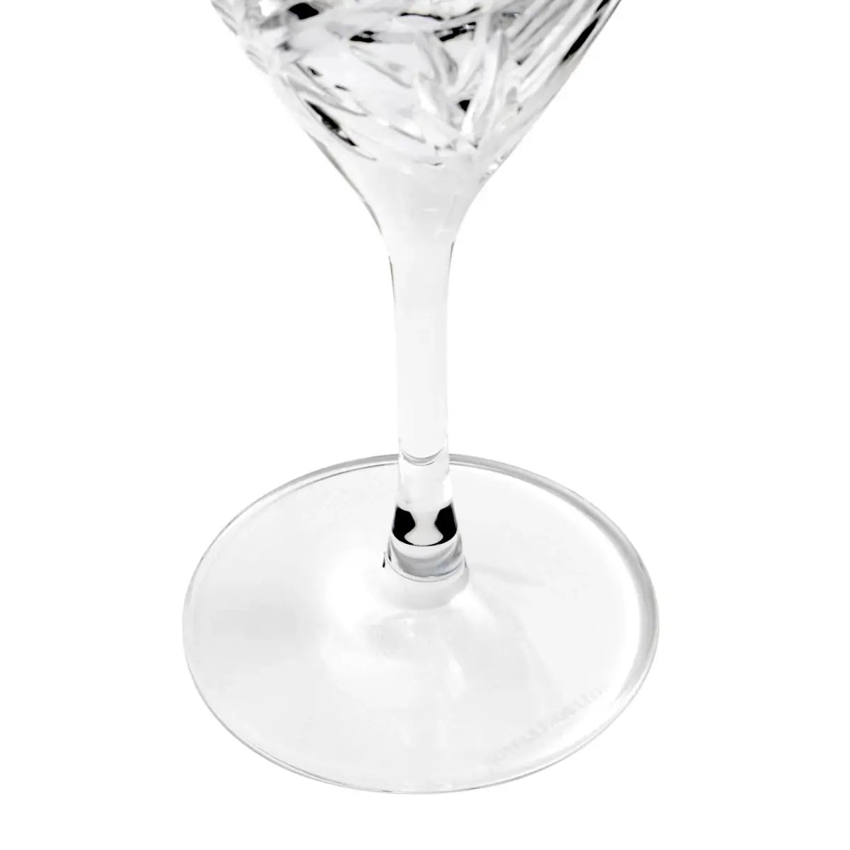 Clear martini glass on a white background