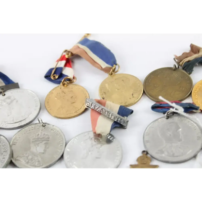 Detailed craftsmanship of Royal Medallions Antique featuring British monarchs