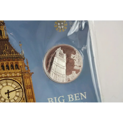 Coin with Big Ben design on a card featuring the clock tower.