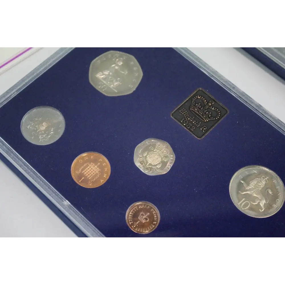 Collector’s display of 13 Royal Mint Proof Sets 1970–1980