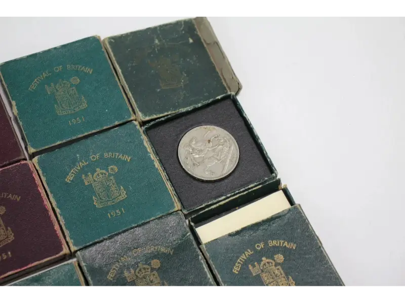 Collection of vintage coins on a white background