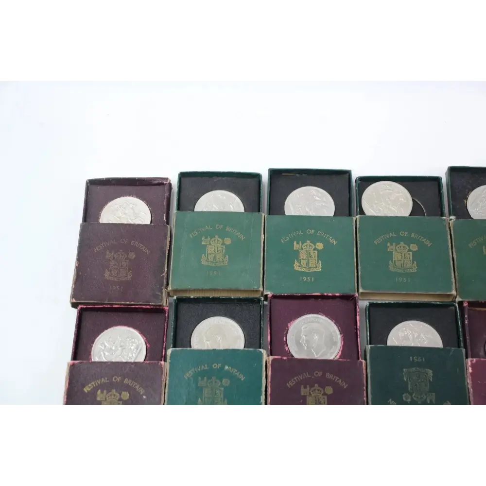 Collection of vintage passport-style boxes with embossed designs