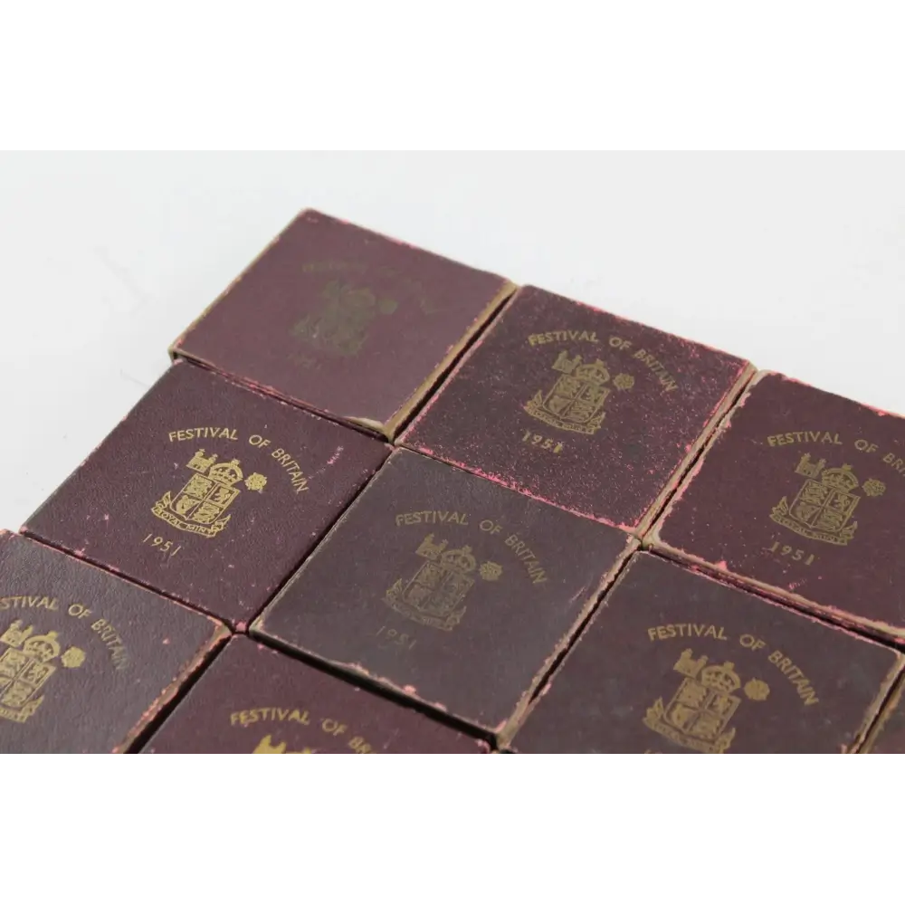 Collection of vintage books with 'Festival of Britain' embossed on the cover.