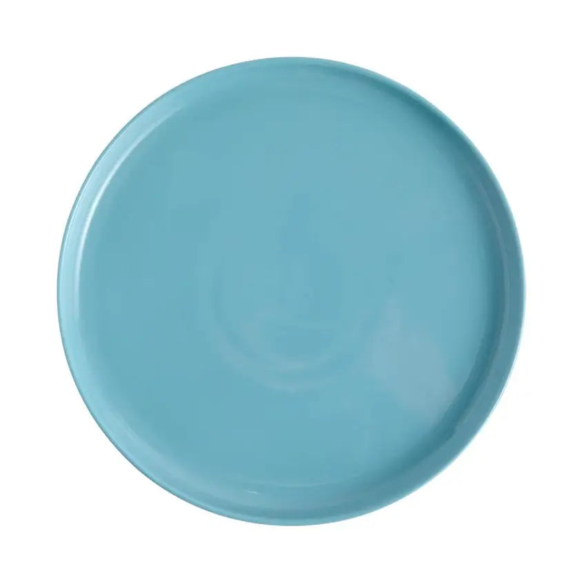 Blue ceramic plate on a white background