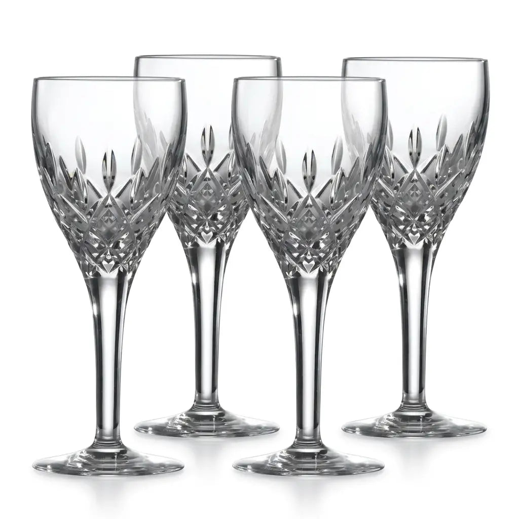 Set of four crystal wine glasses with intricate designs on a white background from our Royal Doulton Collection Australia