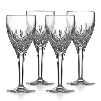 Set of four crystal wine glasses with intricate designs on a white background from our Royal Doulton Collection Australia
