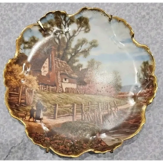 Decorative plate with a scenic village design 