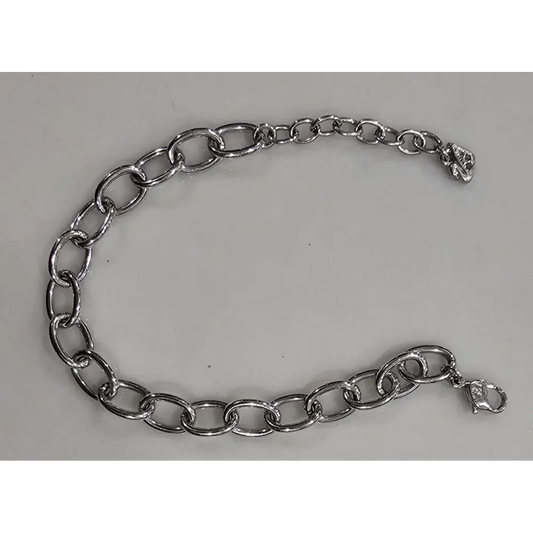 Silver chain bracelet on a gray background