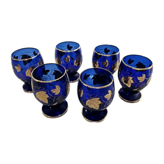 Set of 6 Vintage Bohemian Cobalt Blue Glass Goblets with hand-painted gold grape leaf patterns. from our Antique & Vintage Collection