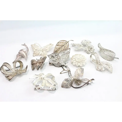 Collection of silver brooches