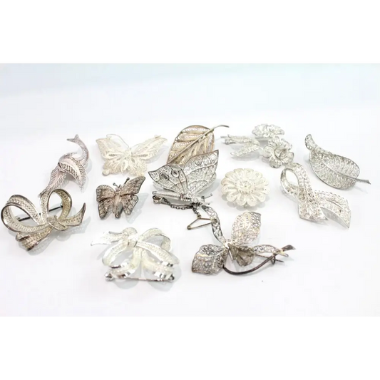 Collection of silver brooches