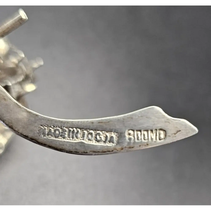 Metallic object with engraved text
