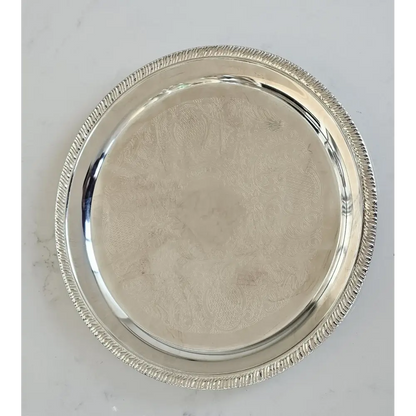 Silver platter with intricate design 