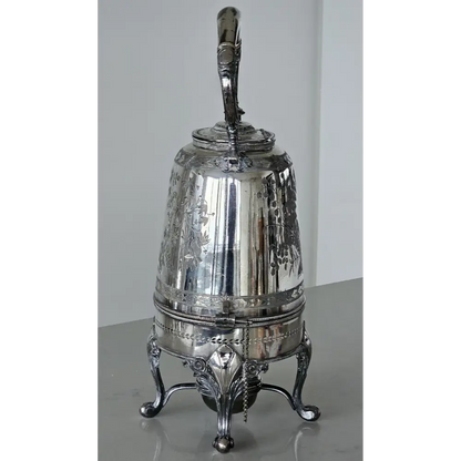 Silver decorative object with a handle