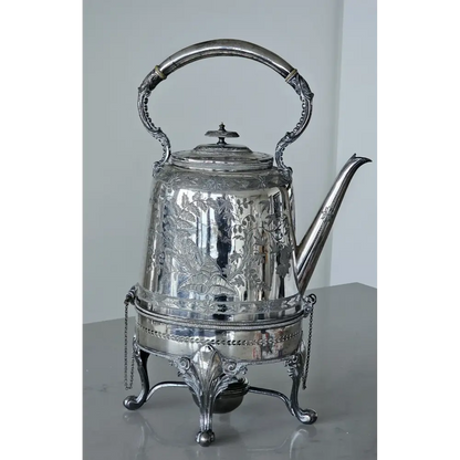 Silver teapot with decorative patterns