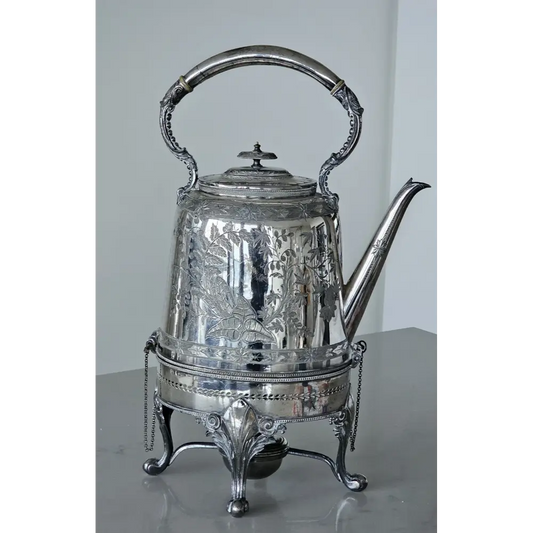 Silver teapot with decorative patterns