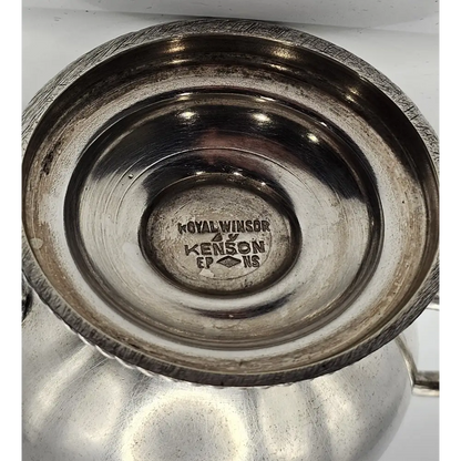 Close-up of a metallic bowl with 'Royal Windsor' branding