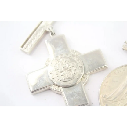 Silver cross pendant