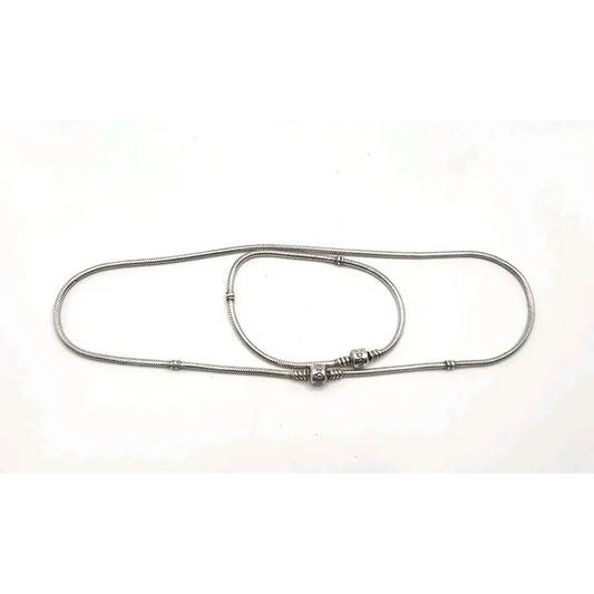 Metallic bracelet  and Necklace on a white background