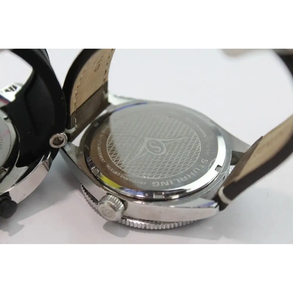 Close-up of a watch with a visible brand 