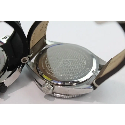 Close-up of a watch with a visible brand 