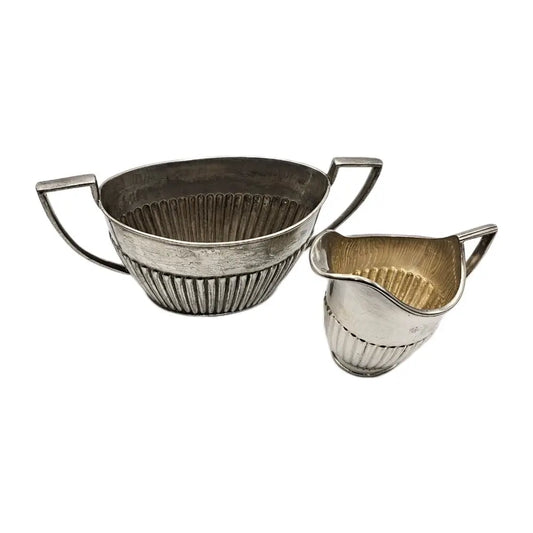 Two metal strainers with handles