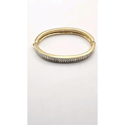 Gold Bangle with diamond accents 