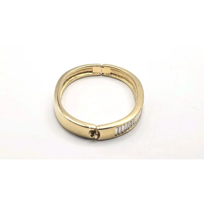 Gold  Bangle with engraved text on a white background