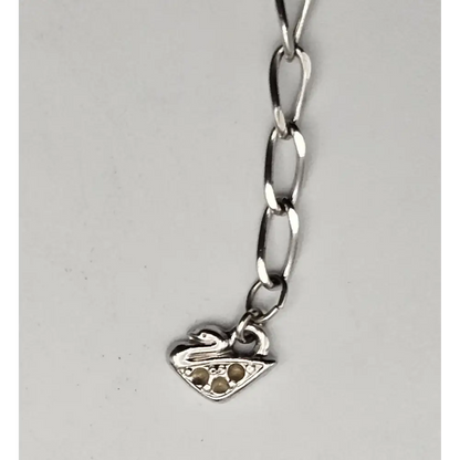 Silver chain with a heart-shaped pendant
