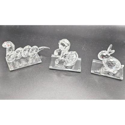 Three clear crystal animal figurines