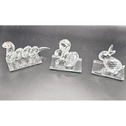 Three clear crystal animal figurines