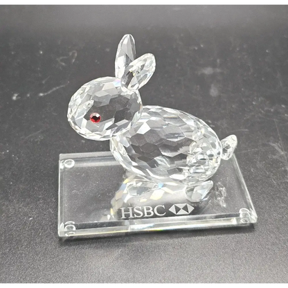Crystal rabbit figurine on an HSBC branded 