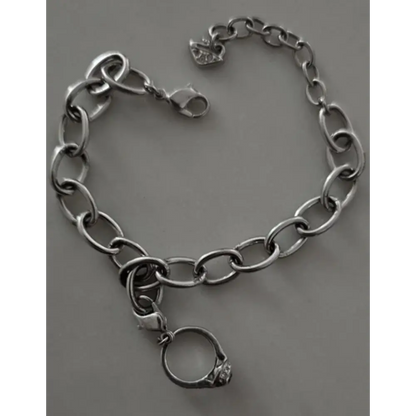 Silver chain bracelet with a ring charm