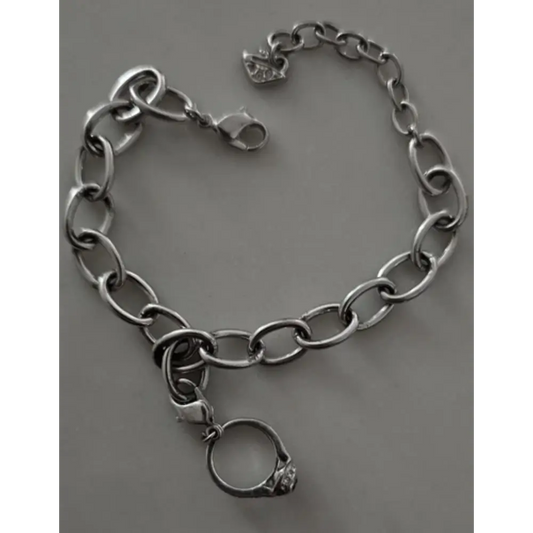 Silver chain bracelet with a ring charm